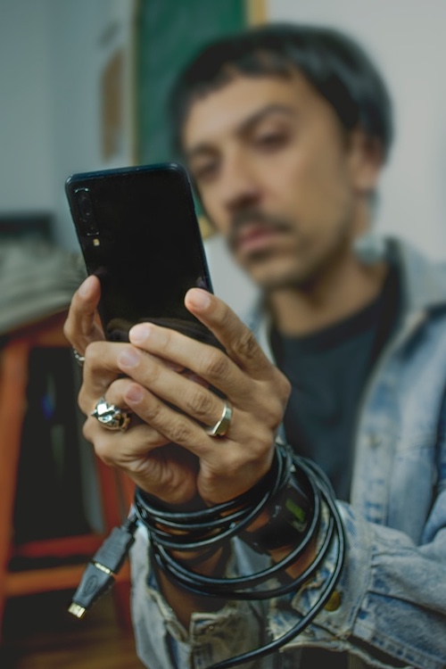 A man on a phone using Dispatchen